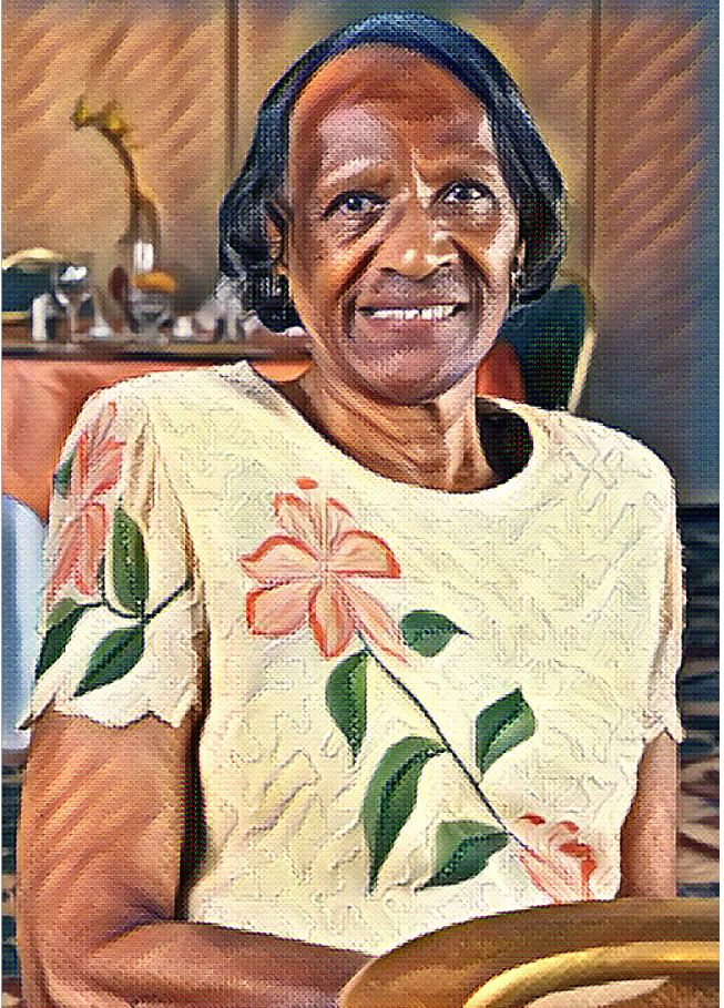 A women posing for the camera wearing flower tshirt